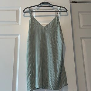 Small Lulu’s mini dress. Beautiful green pinstripes with a bow tie in the back.